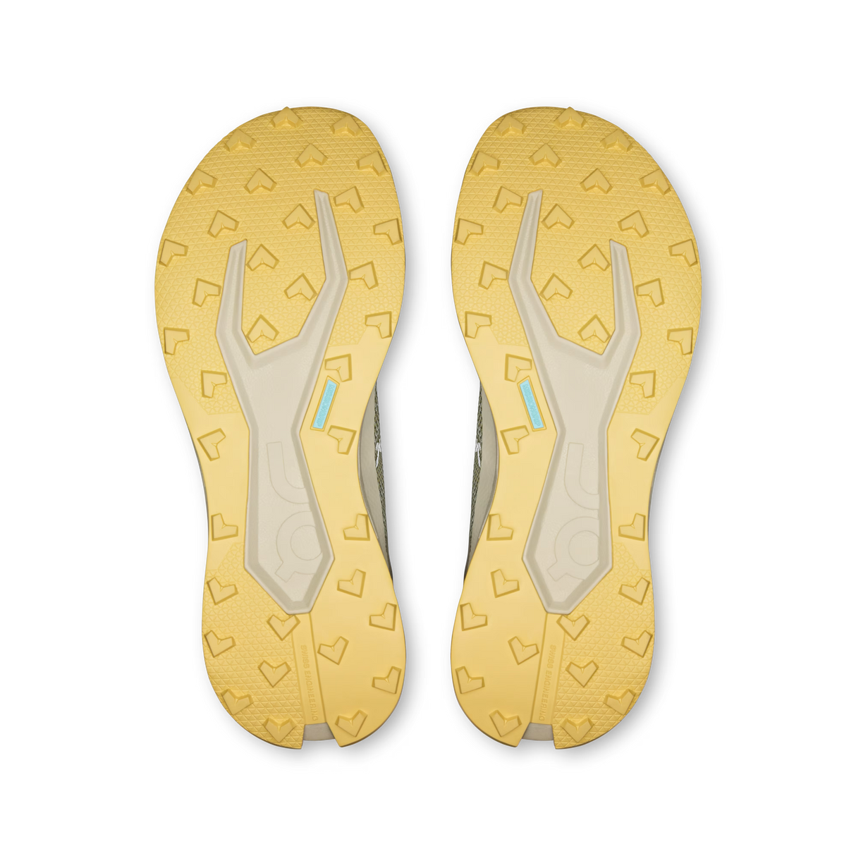 Top-down view of a pair of athletic shoes showing their yellow and beige outsoles with heart-shaped tread patterns and a small light blue accent. - On Cloudultra 3 Shoes (Men's) - Brume/Winter