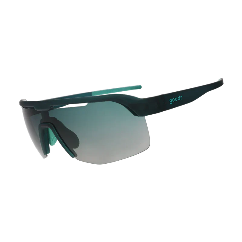 Sunglasses with black frame and green-tinted lenses on a white background - Goodr Bolt G's Sunglasses - Electric Zen Machine