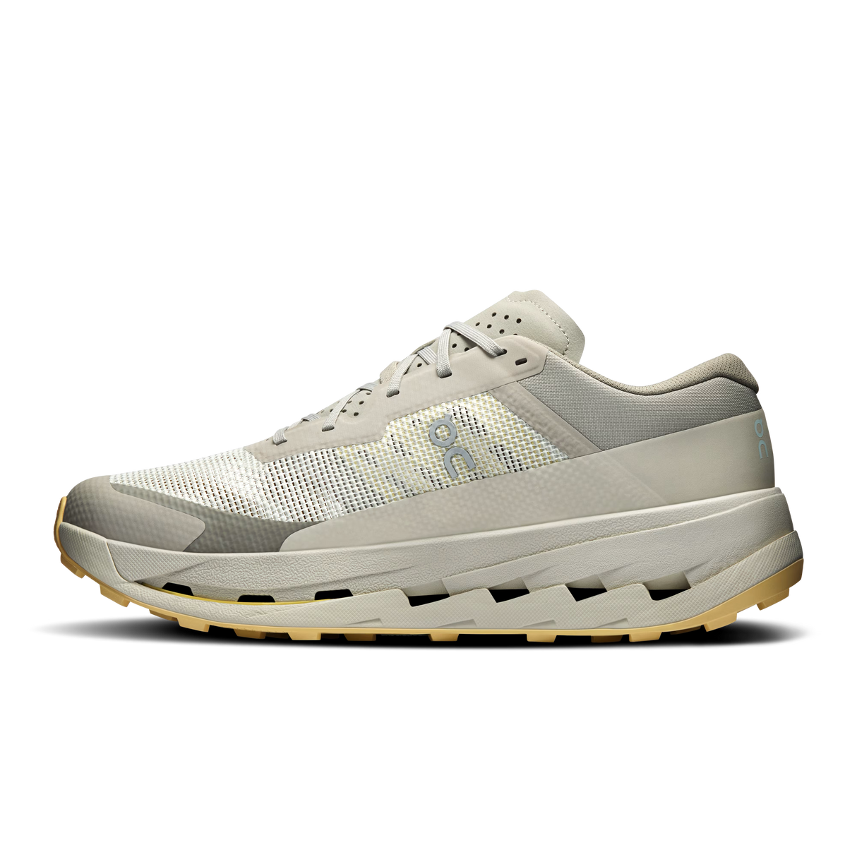 A single athletic trail running shoe shown in profile against a solid white background. The shoe features a light gray and off-white mesh and synthetic upper, a thick light gray midsole with a chunky gum outsole, and a small light blue logo on the side. - On Cloudultra 3 Shoes (Men's) - Brume/Winter