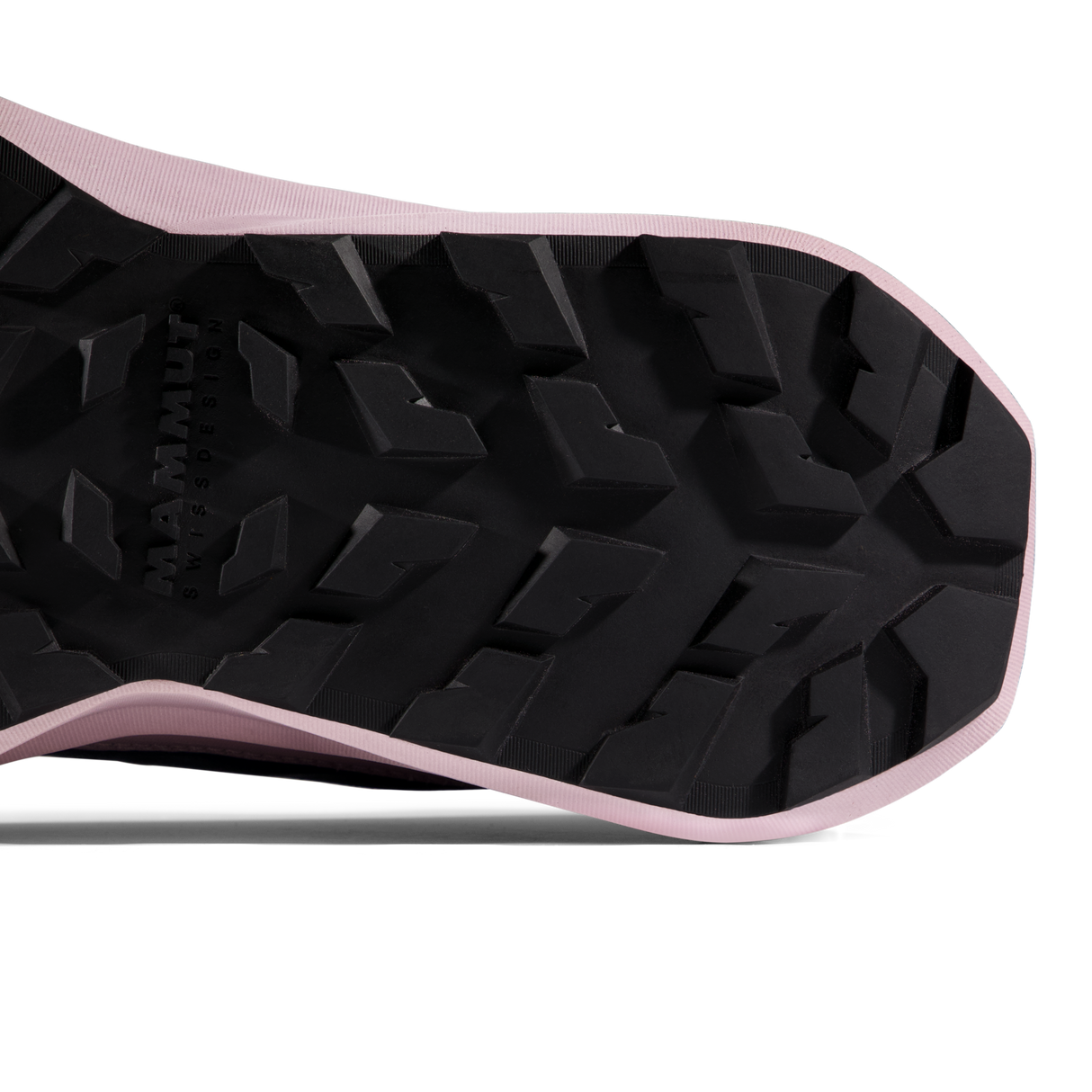 Close-up of the treaded black outsole of a running shoe, showing the Mammut logo embossed in the lug pattern and a light pink edge. - Mammut Aenergy Hike Low GORE-TEX Shoes (Women's) - Marine/Dark Alpine Calamint