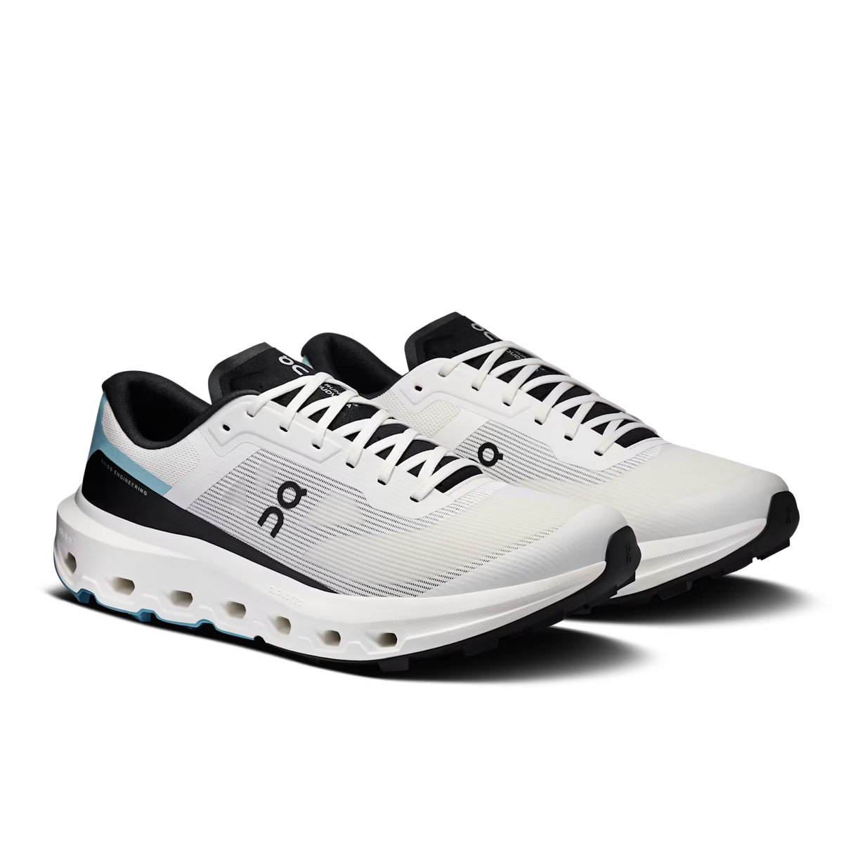A pair of On running shoes in white, black, and light blue, shown from a three-quarters angle on a white background. - On Cloudvista 3 Shoes (Men's) - Ivory/Wash