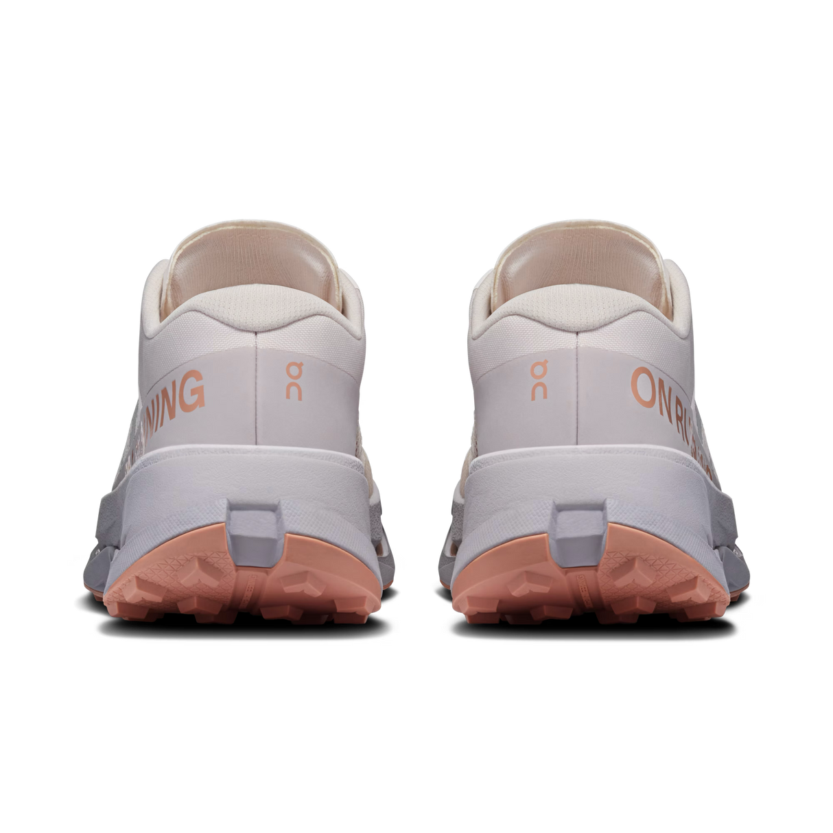 A pair of On Running trail shoes shown from the back, featuring a light gray and off-white upper, peach-pink midsoles, and a coral-pink outsole. - On Cloudultra 3 Shoes (Women's) - Oyster/Ether