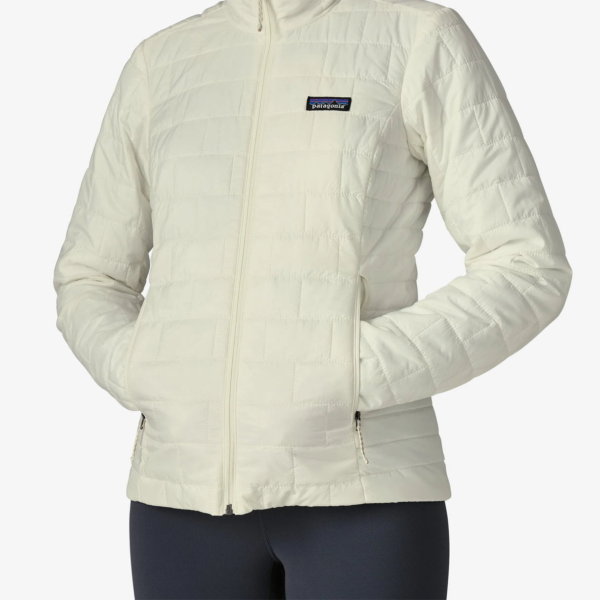 Light gray jacket with a Patagonia logo on a white background - Patagonia Nano Puff Jacket (Women's) - Birch White