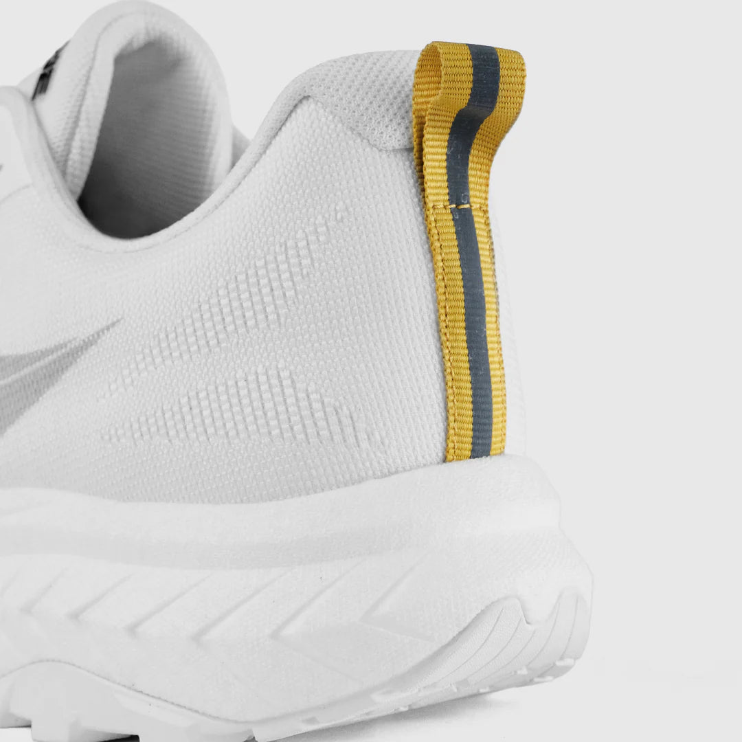White athletic shoe with a yellow and gray accent on a white background - Tarkine Bandicoot Shoes (Women's) - Whiteout