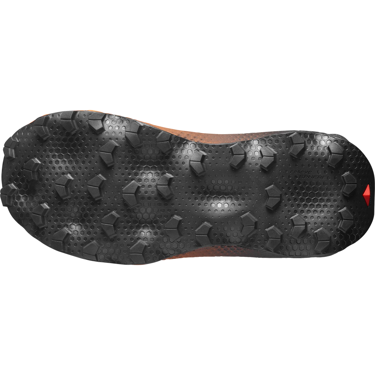 The black treaded outsole of a trail running shoe, showing its aggressive grip pattern and textured design against a white background. - Salomon Ultra Glide 4 Shoes (Women's) - Huckleberry/Black/Red Orange