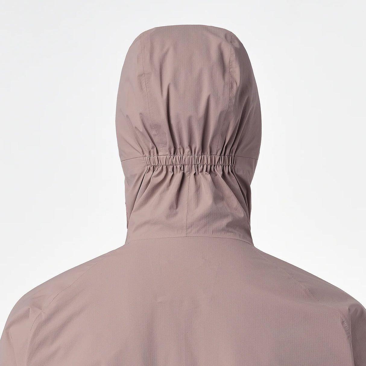 Rear view of a hooded jacket in a muted dusty mauve color, featuring an elasticized hood neck, shown on a plain white background. - Salomon Bonatti Waterproof Jacket (Women's) - Antler