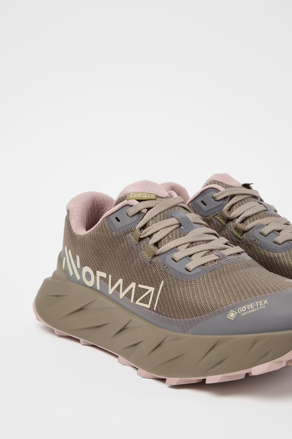 Pair of hiking shoes with visible brand name on a white background - NNormal Cadí GORE-TEX Shoes (Women's) - Brown