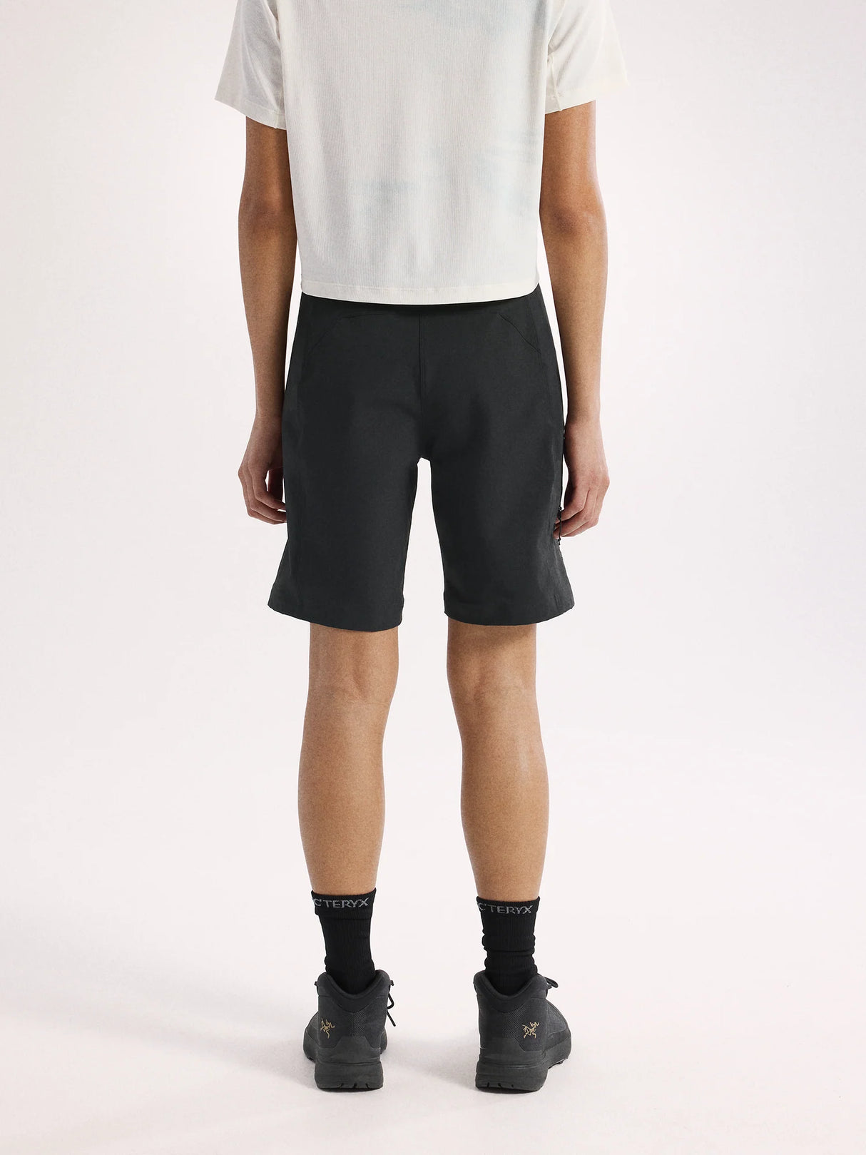 Person wearing black shorts on a white background - Arc'teryx Gamma Shorts 9" (Women's) - Black