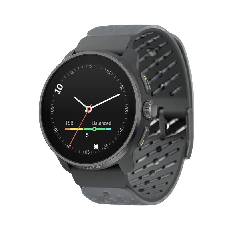 A dark gray smartwatch with a round black face and a perforated dark gray silicone strap, shown at an angle on a plain white background. - Suunto Race S Titanium GPS Sports Watch - Graphite