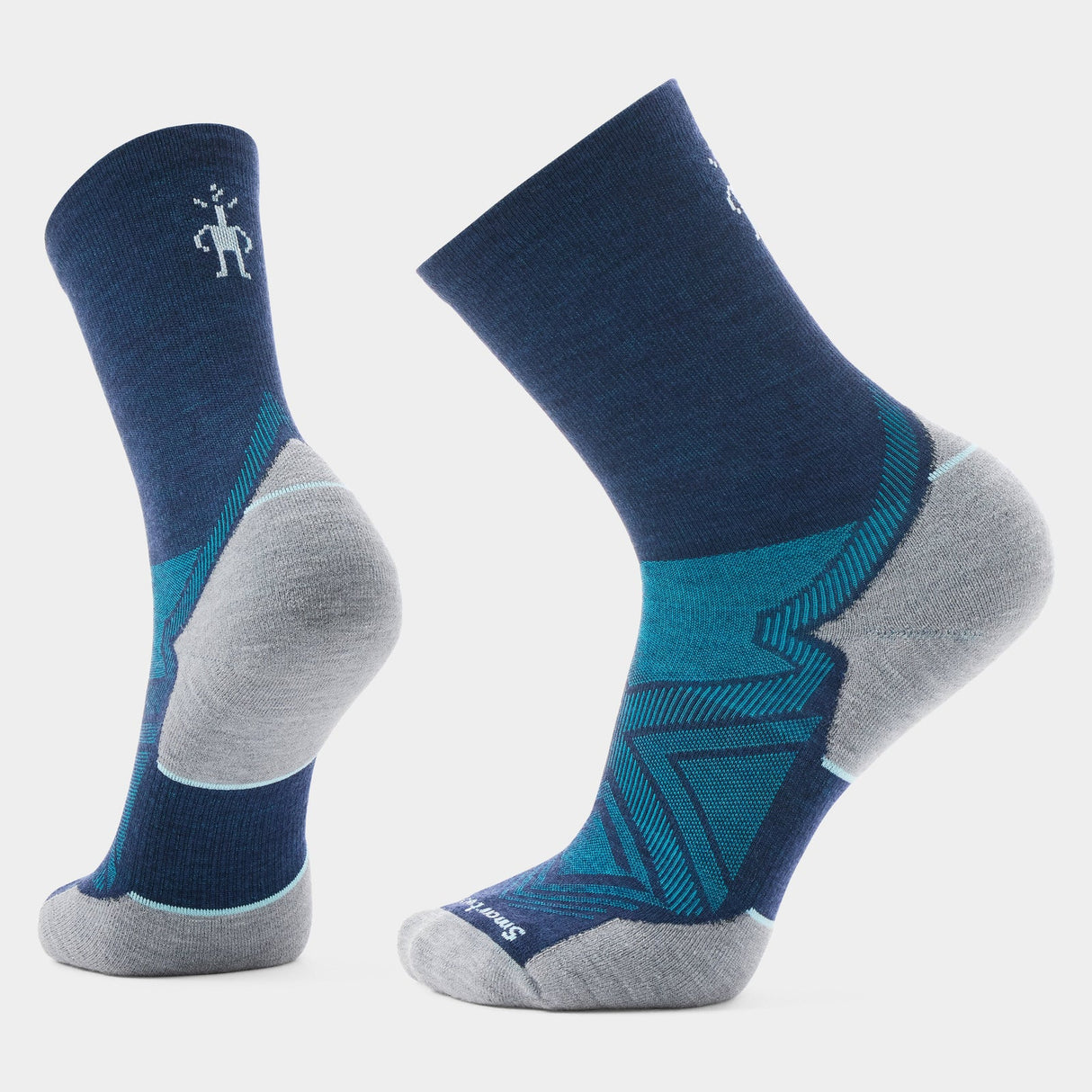 Pair of blue and gray socks on a light gray background - Smartwool Run Targeted Cushion Mid Crew Socks (Unisex) - Deep Navy