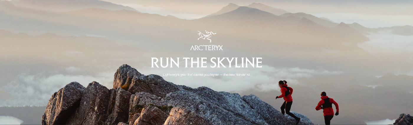 Two people sky running on a mountain in queenstown tasmania with Arc'teryx branding and 'Run the Skyline' text.