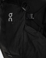 Black backpack with 'on' logo on a black background - On Trail Pack 20L - Black