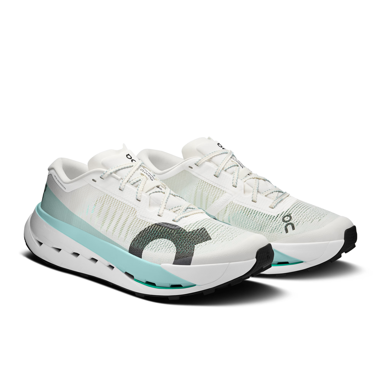 A pair of On running shoes in white and mint green, featuring a textured knit upper, a thick cushioned sole, and the signature On logo on the side, set against a plain white background. - On Cloudultra Pro Shoes (Men's) - Ivory/Celeste