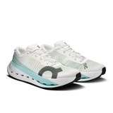 A pair of On running shoes in white and mint green, featuring a textured knit upper, a thick cushioned sole, and the signature On logo on the side, set against a plain white background. - On Cloudultra Pro Shoes (Men's) - Ivory/Celeste