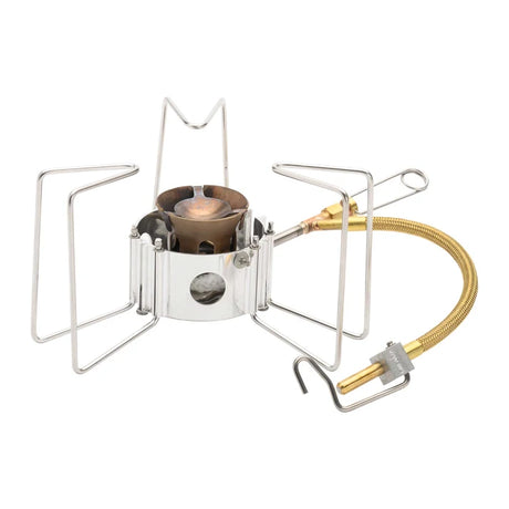 Portable camping stove with a visible flame on a white background - MSR Dragonfly Stove
