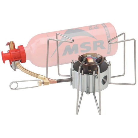  MSR camping stove with pink fuel canister on a white background - MSR Dragonfly Stove