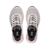 A pair of On Cloudrunning sneakers shown from a top-down view. The shoes feature a light gray and off-white mesh upper, white laces, a black collar, and a black insole with the On logo, with a subtle dusty rose accent at the heel. - On Cloudvista 3 Shoes (Women's) - Oyster/Barberry