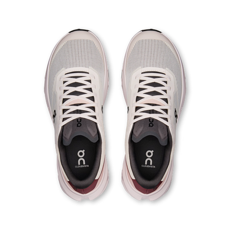 A pair of On Cloudrunning sneakers shown from a top-down view. The shoes feature a light gray and off-white mesh upper, white laces, a black collar, and a black insole with the On logo, with a subtle dusty rose accent at the heel. - On Cloudvista 3 Shoes (Women's) - Oyster/Barberry