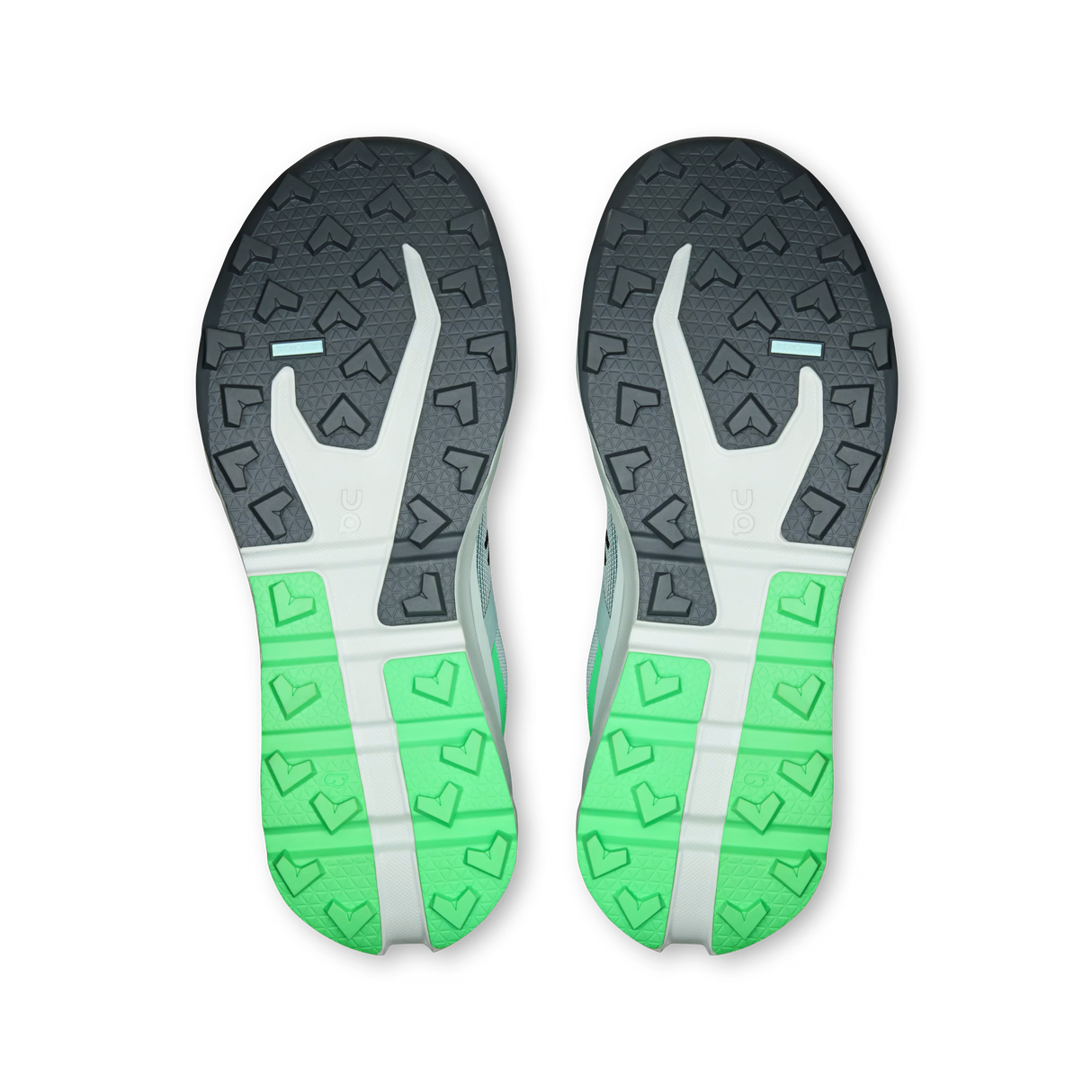 Top-down view of a pair of running shoes showing their outsoles, featuring a dark gray and white tread pattern with bright green heel sections on a white background. - On Cloudvista 3 Shoes (Men's) - Brook/Verdite