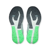 Top-down view of a pair of running shoes showing their outsoles, featuring a dark gray and white tread pattern with bright green heel sections on a white background. - On Cloudvista 3 Shoes (Men's) - Brook/Verdite