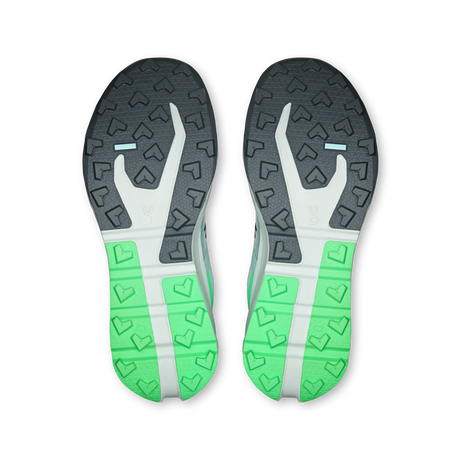 Top-down view of a pair of running shoes showing their outsoles, featuring a dark gray and white tread pattern with bright green heel sections on a white background. - On Cloudvista 3 Shoes (Men's) - Brook/Verdite