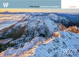 A 2027 wall calendar cover titled 'Wild Island Tasmanian Landscapes' by Rob Blakers, featuring a dramatic aerial photograph of snow-covered mountain peaks above the clouds at sunrise. - Rob Blakers Tasmanian Landscapes Calendar