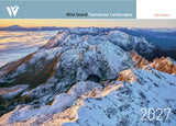 A 2027 wall calendar cover titled 'Wild Island Tasmanian Landscapes' by Rob Blakers, featuring a dramatic aerial photograph of snow-covered mountain peaks above the clouds at sunrise. - Rob Blakers Tasmanian Landscapes Calendar