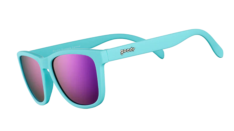 Goodr ELECTRIC DINOTOPIA CARNIVAL turquoise sunglasses with pink lenses on a white background
