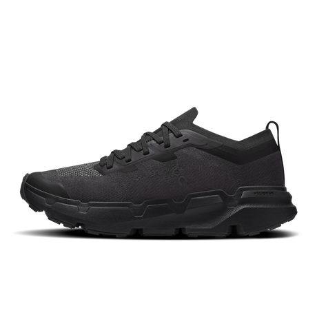 A black athletic sneaker shown from a side profile view against a solid white background. - On Cloudsoma Shoes (Women's) - Black