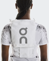 Person wearing a white vest with 'on' logo on a light gray background - On Ultra Vest Pro (Unisex) - White