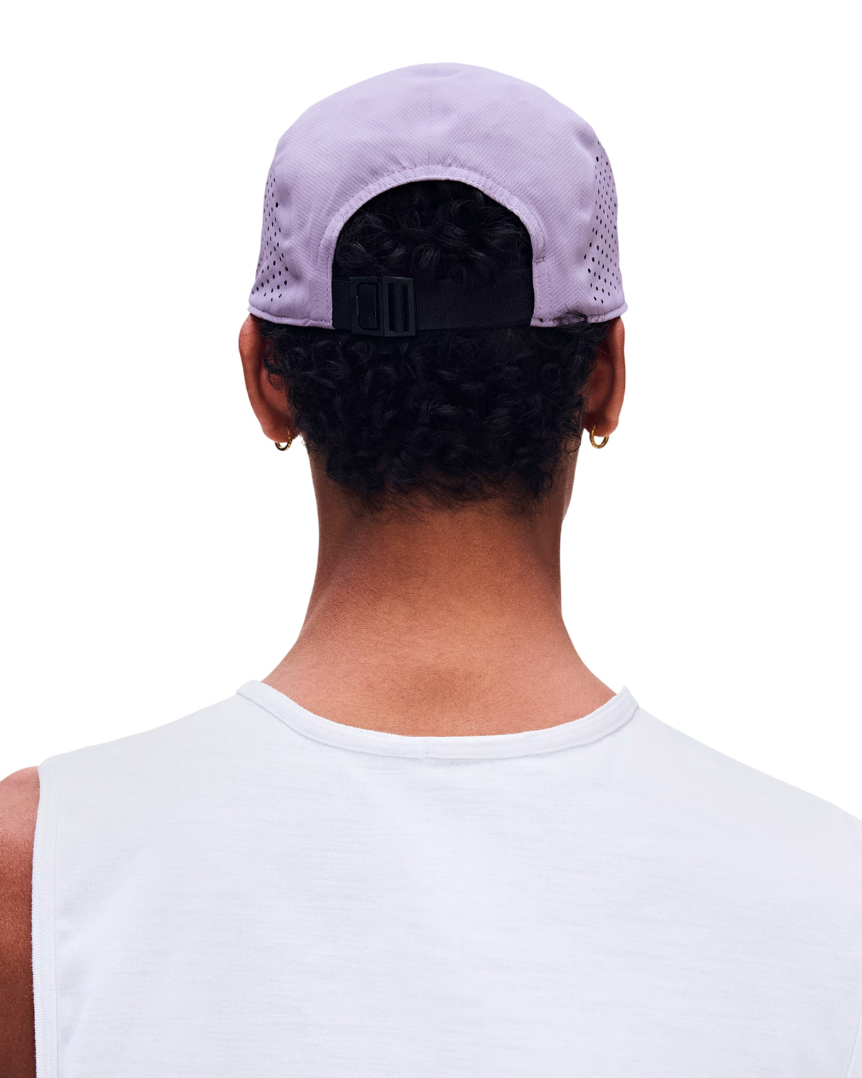Rear view of a person wearing a light lavender mesh-back baseball cap with a black adjustable strap, paired with a white sleeveless shirt against a plain white background. - On Lightweight Cap - Mallow