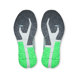 The soles of a pair of running shoes, viewed from above. The outsole features a dark gray and white patterned upper section and a bright green and white patterned heel section. - On Cloudvista 3 Shoes (Women's) - Flurry/Verdite