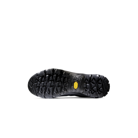 A single black hiking boot shown from the sole view against a plain white background, featuring a deep treaded outsole and a small yellow Vibram logo. - Mammut Mercury IV Mid GORE-TEX (Men's) - Dark Titanium/Black