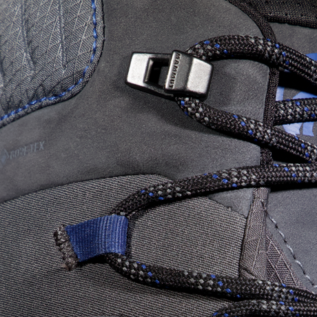 Close-up of a gray hiking boot with laces and brand logo. - Mammut Mercury IV Mid GORE-TEX (Men's) - Dark Titanium/Black