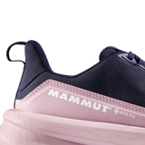 Close-up of a Mammut sneaker showing the heel and side profile, featuring a dark navy blue upper, a light pink midsole section with white Mammut and GORE-TEX branding, and a pale pink sole on a white background. - Mammut Aenergy Hike Low GORE-TEX Shoes (Women's) - Marine/Dark Alpine Calamint