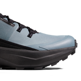 Close-up of a trail running shoe showing the side profile, featuring a light blue textured upper, black laces, and a thick black midsole and outsole on a white background. - Mammut Aenergy Hike Low GORE-TEX (Men's) - Strata/Black