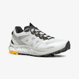 White running shoe with black and orange accents on a white background - SCARPA Spin Planet (Women's) - White/Saffron