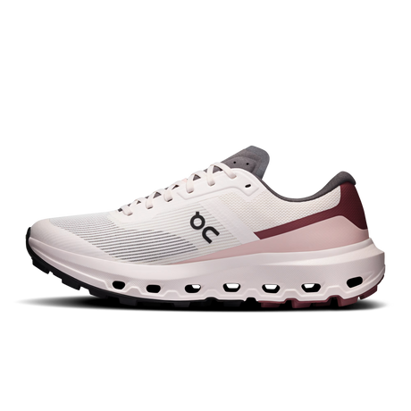 A side-profile view of an On running shoe in white, dusty rose, and gray, featuring the signature 'on' logo on the side and a thick cushioned sole. - On Cloudvista 3 Shoes (Women's) - Oyster/Barberry