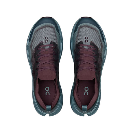 A pair of On running shoes shown from a top-down view, featuring a dark teal and gray mesh upper with burgundy laces and lining. - On Cloudsoma Shoes (Men's) - Urchin/Agave