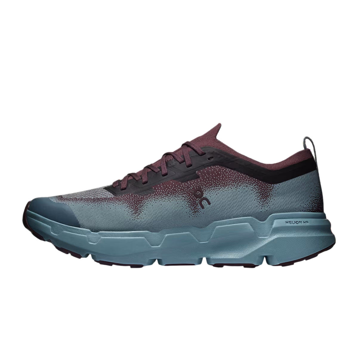A single athletic trail running shoe shown in profile against a solid white background. The shoe features a textured speckled upper in shades of slate blue-gray and deep burgundy, with a thick, chunky, sculpted sole in a muted teal-blue color. - On Cloudsoma Shoes (Men's) - Urchin/Agave