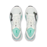 A pair of On running shoes shown from a top-down view, featuring a white mesh upper with mint green accents and black logo details. - On Cloudultra Pro Shoes (Men's) - Ivory/Celeste