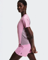 Person wearing a pink athletic outfit on a white background - On Performance-T (Women's) - Dewberry/Sakura