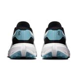 Rear view of a pair of On running shoes in black, white, and light blue, showing the heel counter, logo, and sole details on a white background. - On Cloudvista 3 Shoes (Men's) - Ivory/Wash