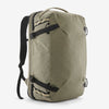 Khaki backpack with black straps on a white background - Patagonia Black Hole MLC Pack 45L - Weathered Stone