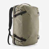 Khaki backpack with black straps on a white background - Patagonia Black Hole MLC Pack 45L - Weathered Stone