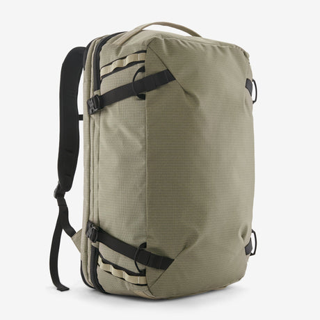 Khaki backpack with black straps on a white background - Patagonia Black Hole MLC Pack 45L - Weathered Stone