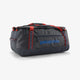 Gray duffel bag with red accents and Patagonia logo on a white background - Patagonia Black Hole Duffel 55L - Smolder Blue w/Amanita Red