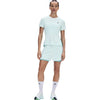 A model wearing a light mint green athletic set consisting of a short-sleeve t-shirt and matching shorts, paired with white socks and running shoes, against a plain white background. - On Performance-T (Women's) - Flurry/Aquamarine