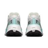 A pair of running shoes shown from the rear, featuring a white and light gray upper with mint green accents and black outsoles, on a solid white background. - On Cloudultra Pro Shoes (Women's) - Ivory/Celeste