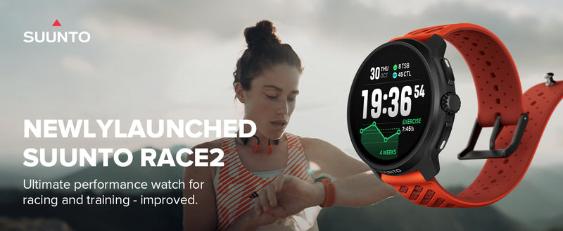 Suunto Race2 smartwatch with a red band displayed on a picture of a girl wearing it in the mountains